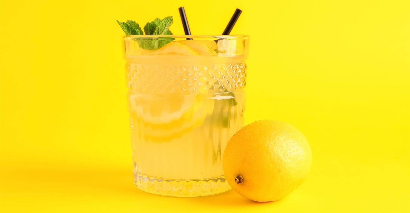 Lemon Juicer Secrets Only Beverage Pros Know About - A delicious glass of lemonade made with a Juicernet lemon juicer