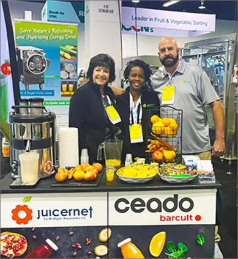 Juicernet's sales team Bonnie, Tracy, and LIanne at a exhibit.