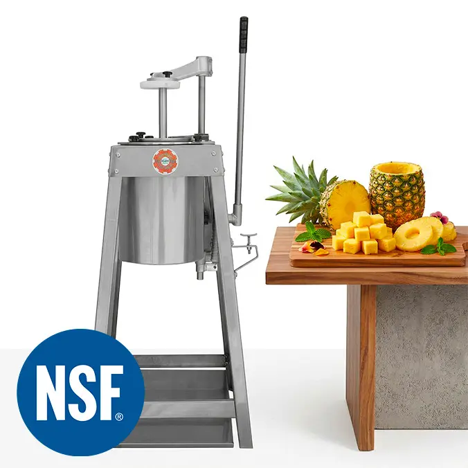 S961 pineapple corer, corering pineapple at a commercial business